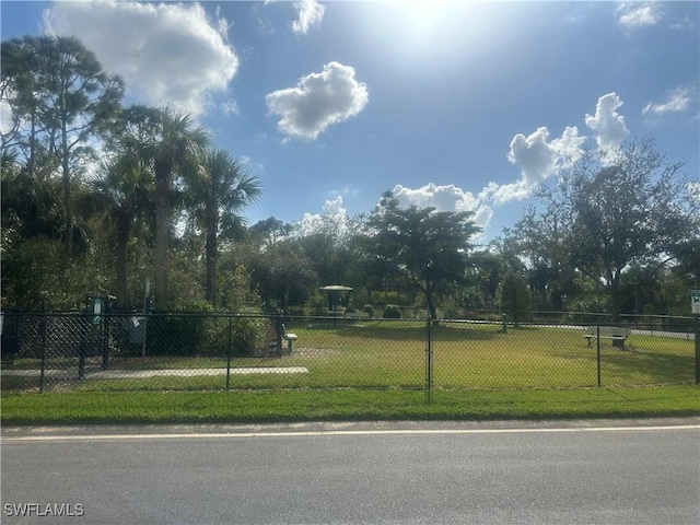 view of home's community featuring a lawn