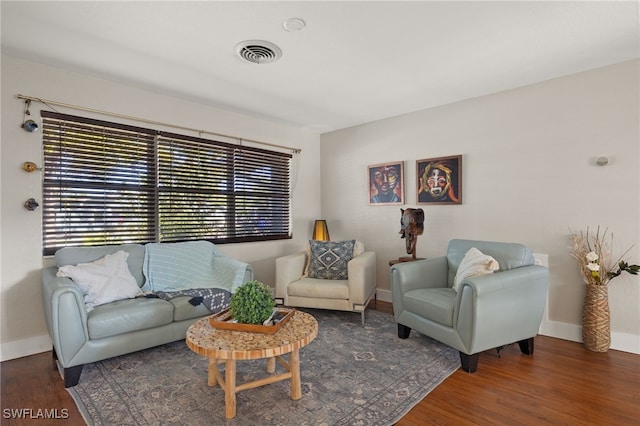 living room featuring dark hardwood / wood-style floors