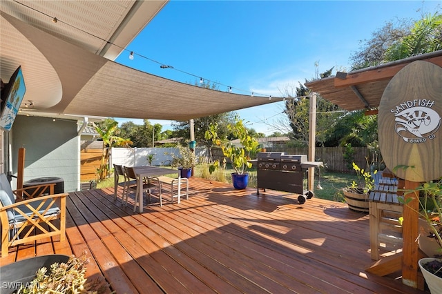 wooden deck with area for grilling