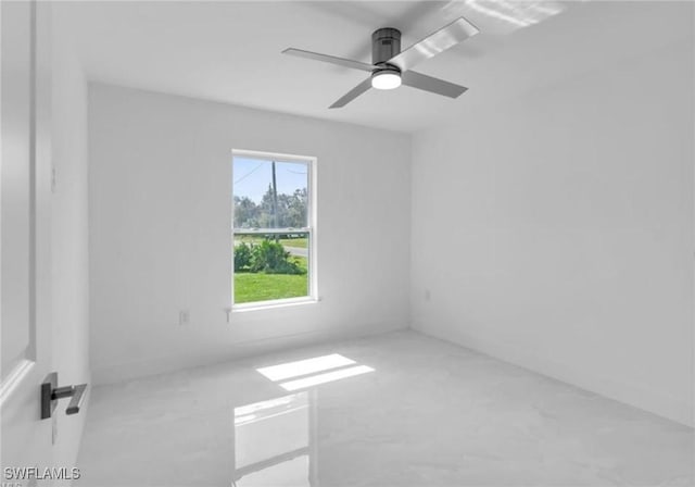 unfurnished room with ceiling fan