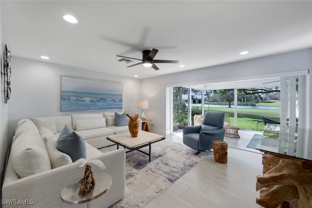 living room featuring ceiling fan