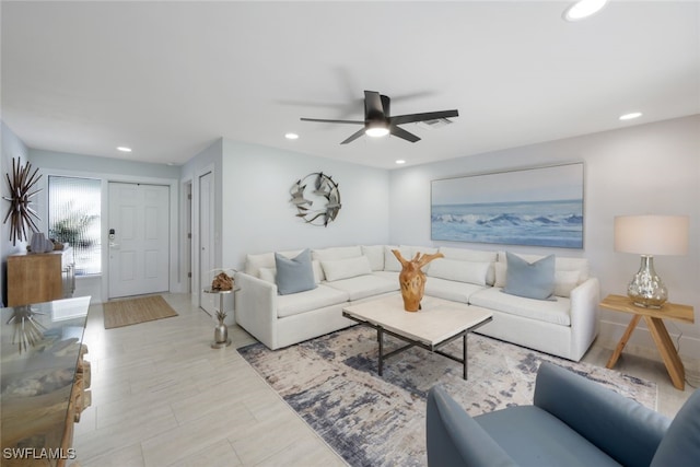 living room with ceiling fan