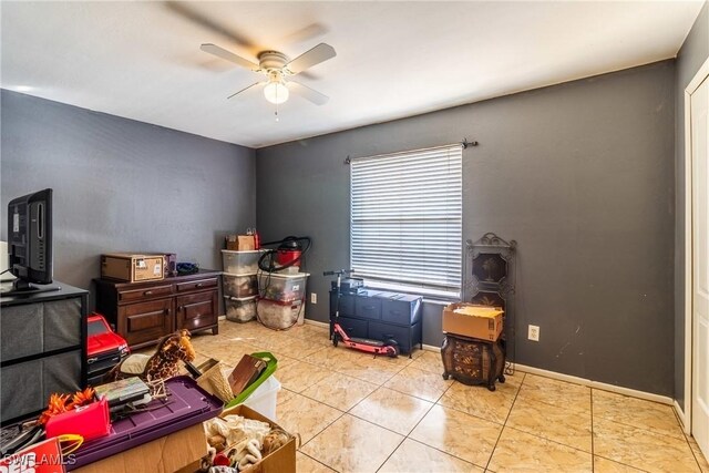 interior space featuring ceiling fan