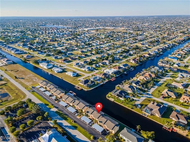 aerial view featuring a water view and a residential view