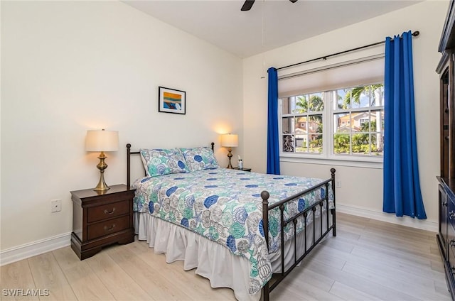 bedroom featuring ceiling fan and light wood-type flooring