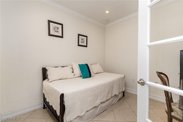 bedroom featuring light tile patterned floors and ornamental molding