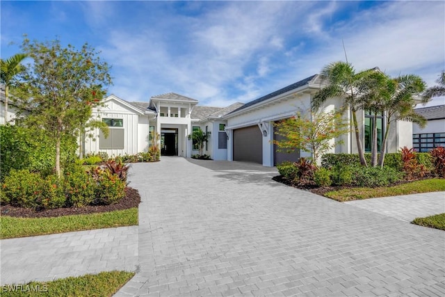 view of front of property featuring a garage