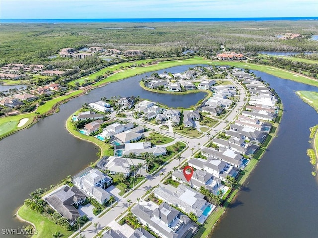 drone / aerial view featuring a water view