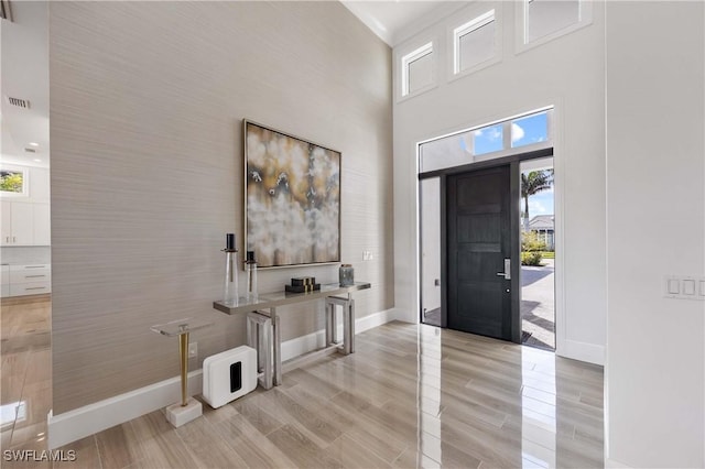 foyer featuring a high ceiling