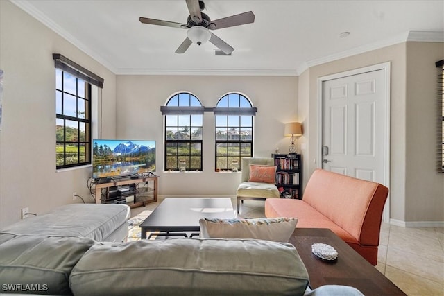 living room featuring ceiling fan, light tile patterned floors, a healthy amount of sunlight, and ornamental molding