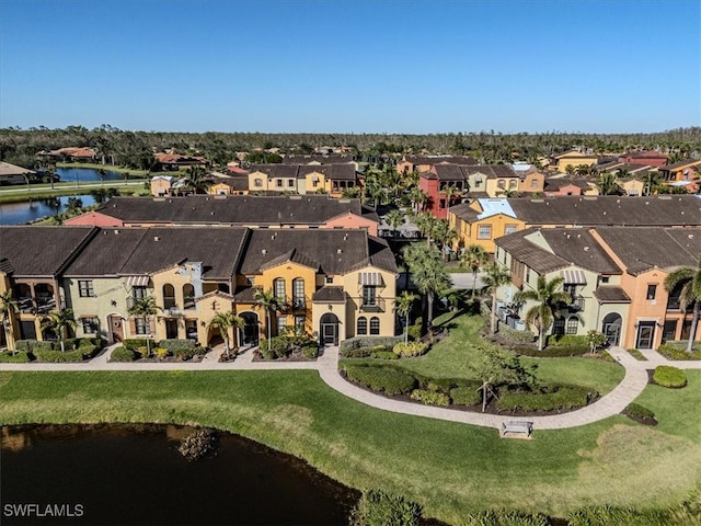 drone / aerial view featuring a water view