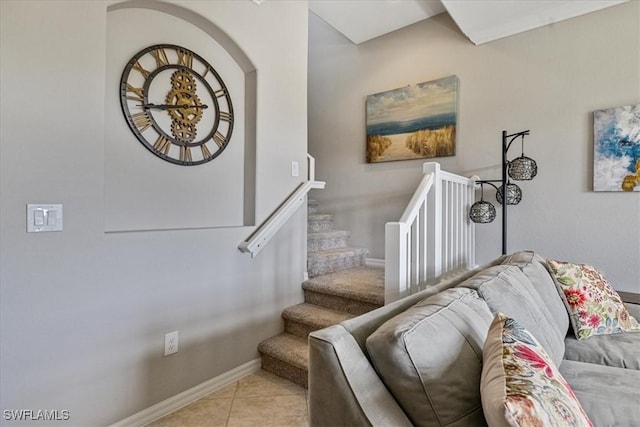 stairs featuring tile patterned flooring