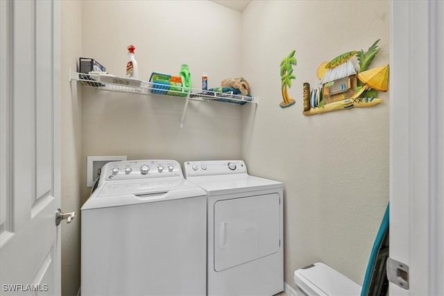 laundry area with washer and clothes dryer