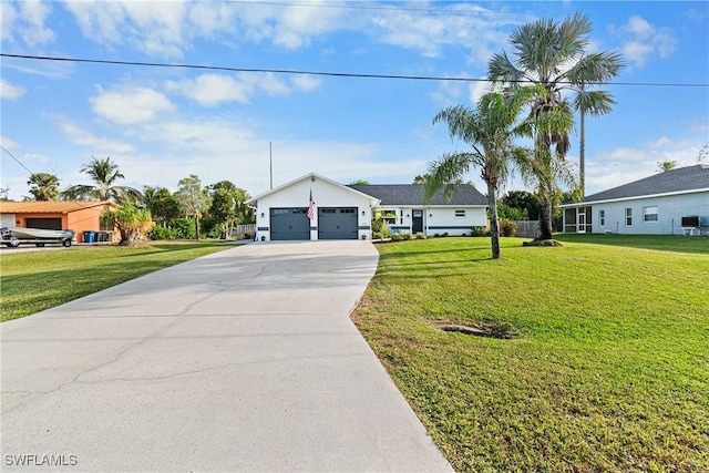 single story home with a front lawn and a garage