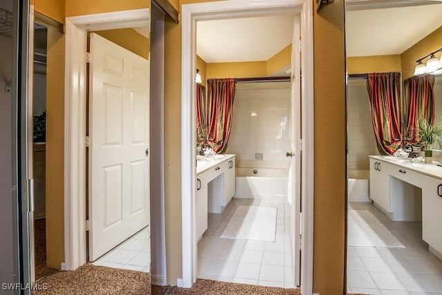 full bathroom featuring tile patterned flooring, shower / bathing tub combination, and vanity