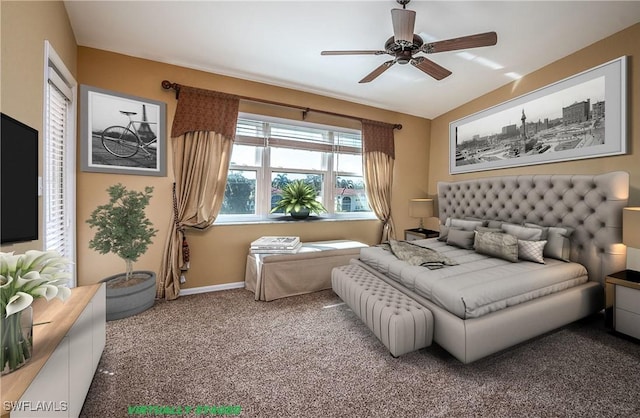 bedroom featuring a ceiling fan, carpet flooring, and baseboards