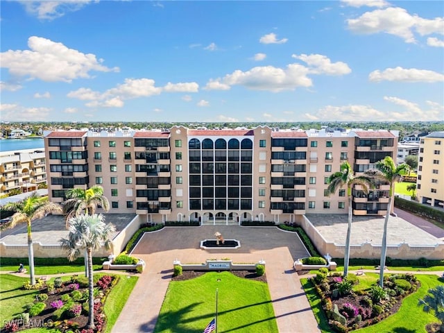 view of building exterior with a water view