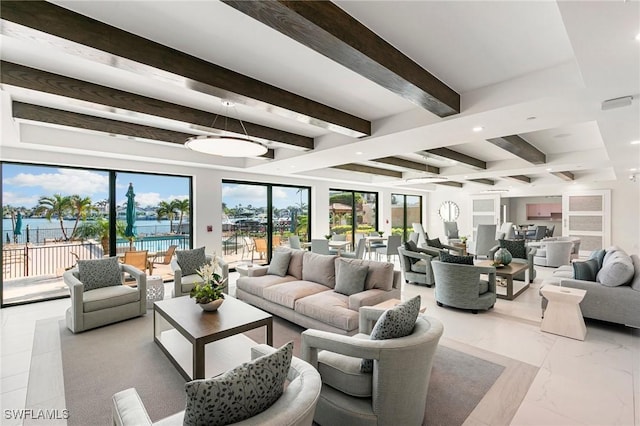 living area featuring plenty of natural light, beam ceiling, and recessed lighting