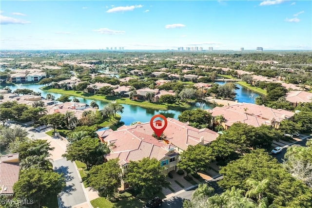 birds eye view of property featuring a water view