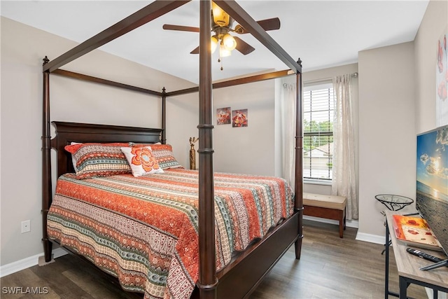 bedroom featuring ceiling fan and dark hardwood / wood-style flooring