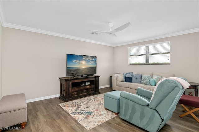 living room featuring ceiling fan, dark hardwood / wood-style floors, and crown molding