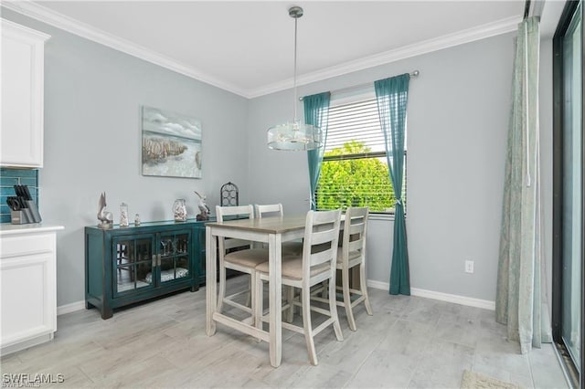 dining room with crown molding