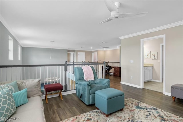 living room featuring ceiling fan, dark wood-type flooring, and crown molding