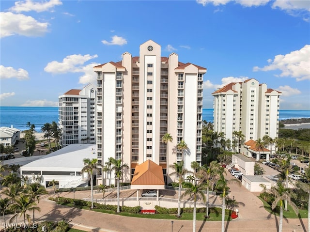 view of building exterior with a water view