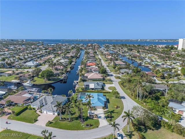 aerial view featuring a residential view and a water view