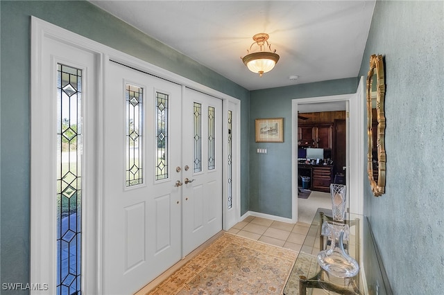 view of tiled entrance foyer