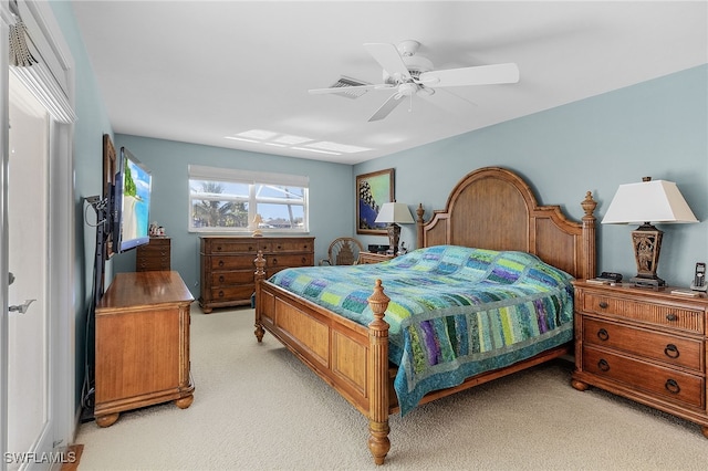 carpeted bedroom with ceiling fan