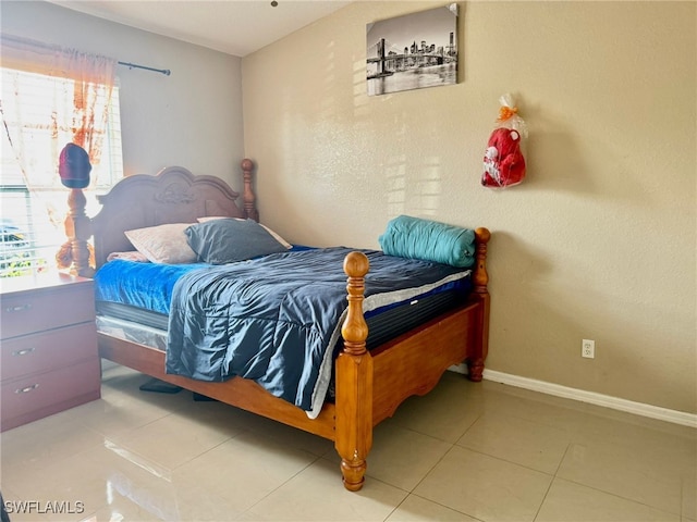 bedroom featuring tile patterned floors