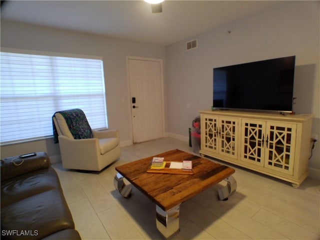 living room with ceiling fan