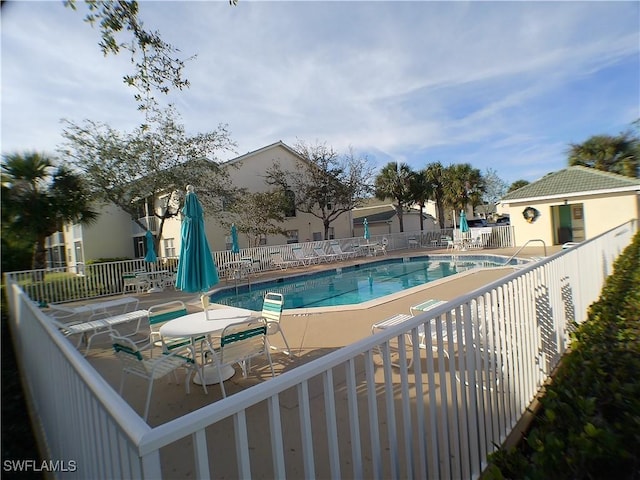 view of pool with a patio area