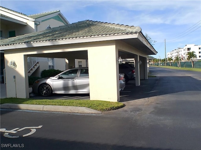 view of parking featuring a carport