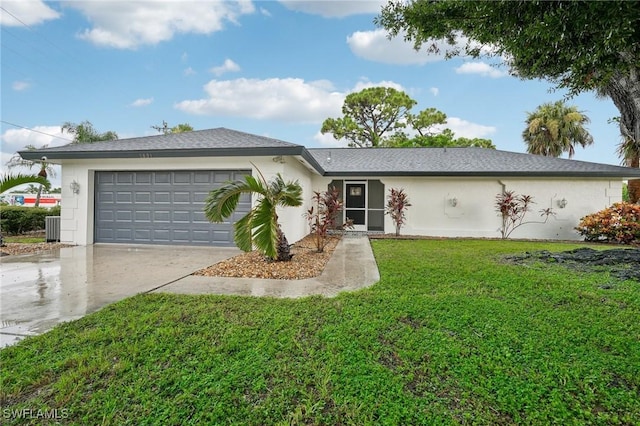 single story home with a front lawn and a garage