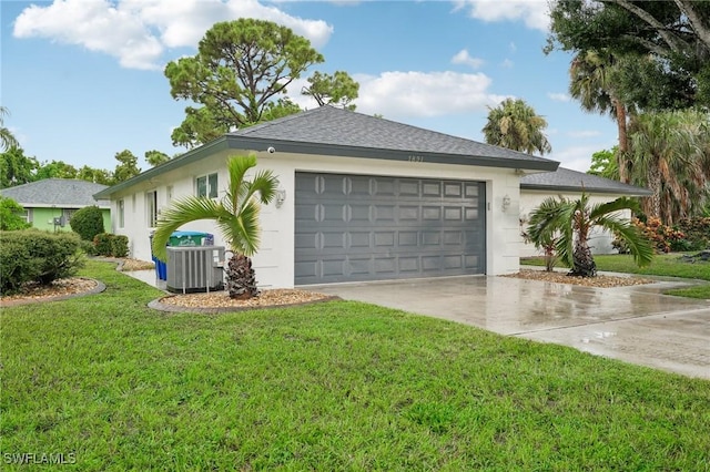 view of home's exterior with a garage, cooling unit, and a lawn