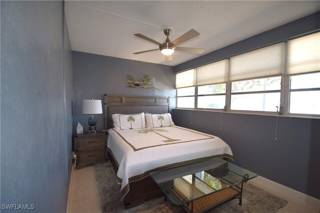 bedroom with carpet flooring and ceiling fan