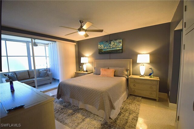 bedroom with access to exterior, ceiling fan, and light colored carpet