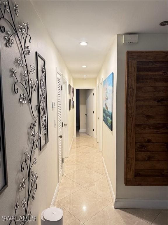 4207 Cindy Ave, Naples, FL 34112 - hall featuring light tile patterned floors, baseboards, and recessed lighting