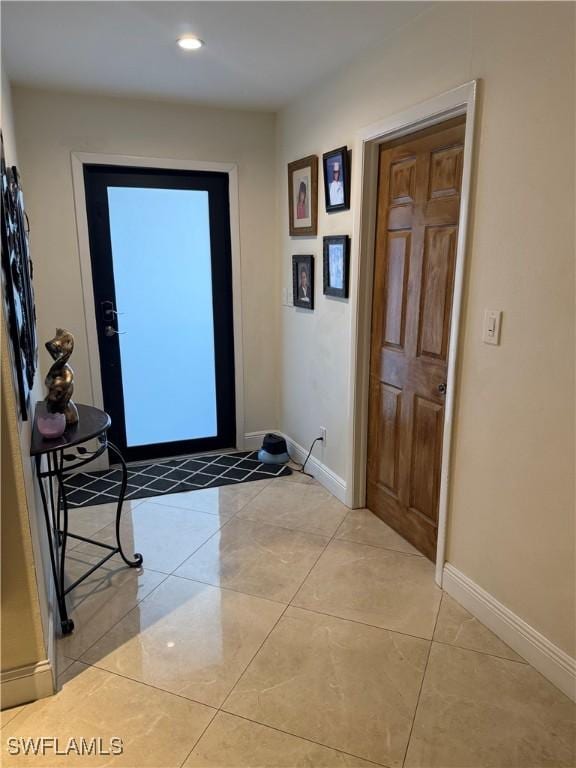 4207 Cindy Ave, Naples, FL 34112 - entryway featuring recessed lighting, baseboards, and light tile patterned flooring