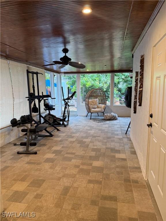 4207 Cindy Ave, Naples, FL 34112 - workout area featuring wood ceiling and ceiling fan