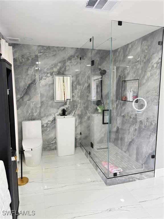 4207 Cindy Ave, Naples, FL 34112 - bathroom featuring visible vents, marble finish floor, a marble finish shower, and toilet
