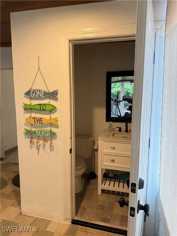 4207 Cindy Ave, Naples, FL 34112 - bathroom with vanity and toilet