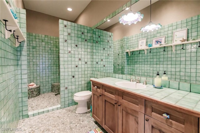 bathroom with tile patterned floors, vanity, and toilet