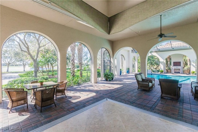 view of patio / terrace featuring ceiling fan