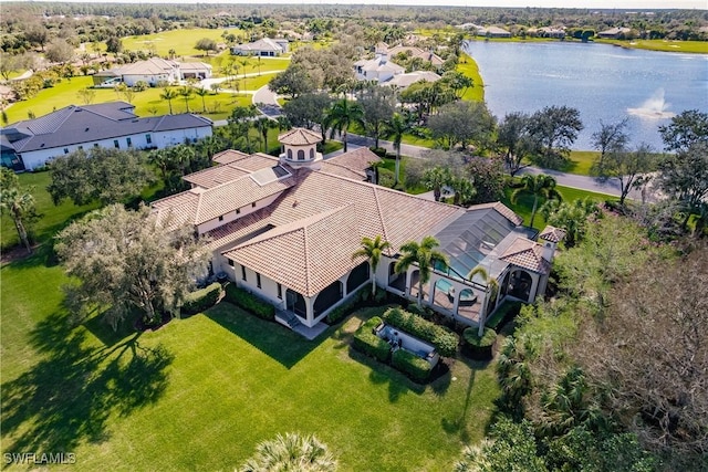 drone / aerial view featuring a water view