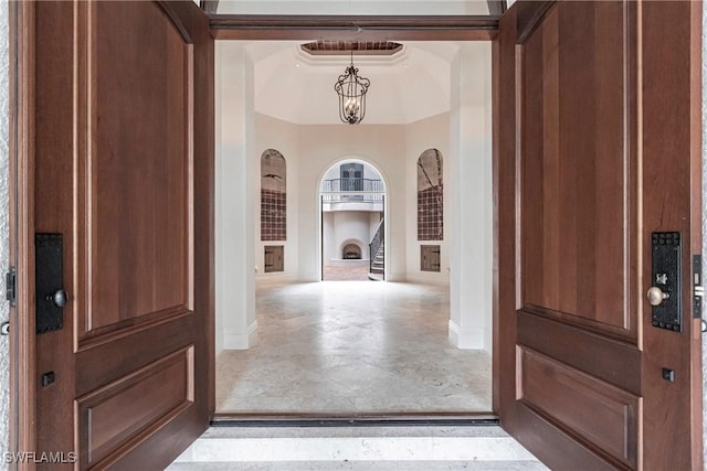 entrance foyer with an inviting chandelier