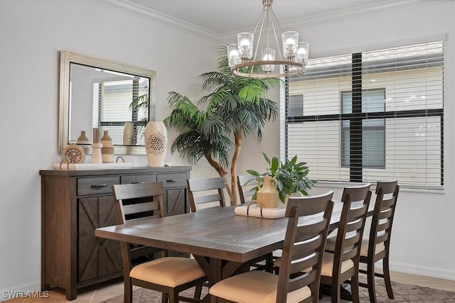 dining area featuring an inviting chandelier, light tile patterned flooring, and ornamental molding