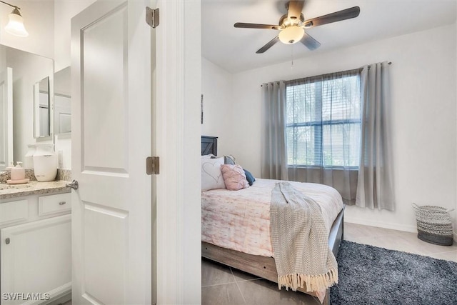 bedroom featuring ceiling fan and light tile patterned flooring